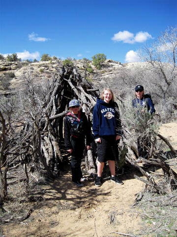 Sierra, Storm and Shauna at log sweat house.