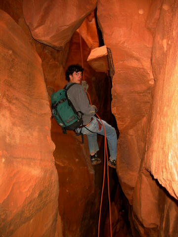 Jason Price rappelling in Pandora's Box.