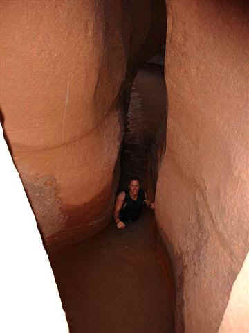 Working the water filled narrows of Davis Gulch.