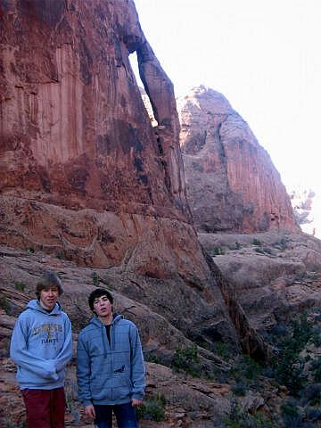 Kasey and Josh with Arch behind them