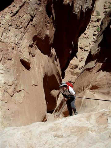 Bruce Newmann rappelling in Angel Slot