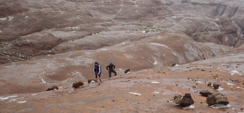 Climbing out of Good Day Jim. Note drifts of hailstones.