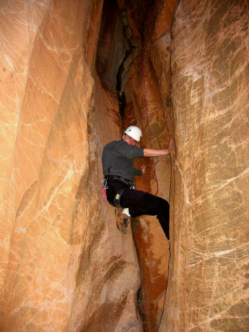 Ryan Cornia downclimbs Middle Fork