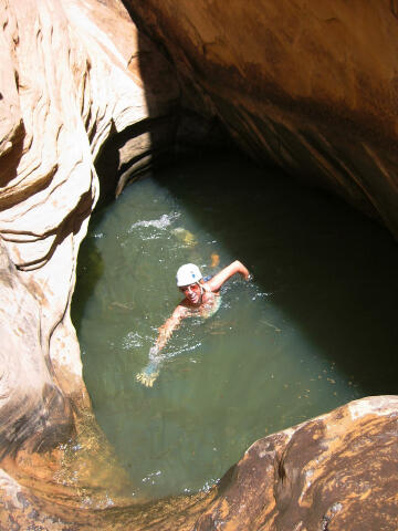 Jane Arhart swimming a pothole.