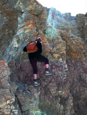 80 year old George Sormer scrambles up the third peak.