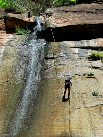 Sierra Burrows rappeling down Mystery Falls.